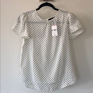 Polka dot flowy top